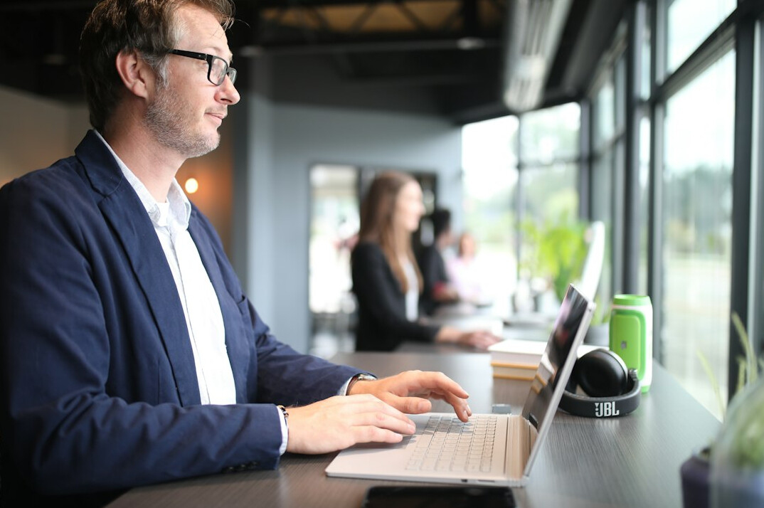 corporate programmer at desk
