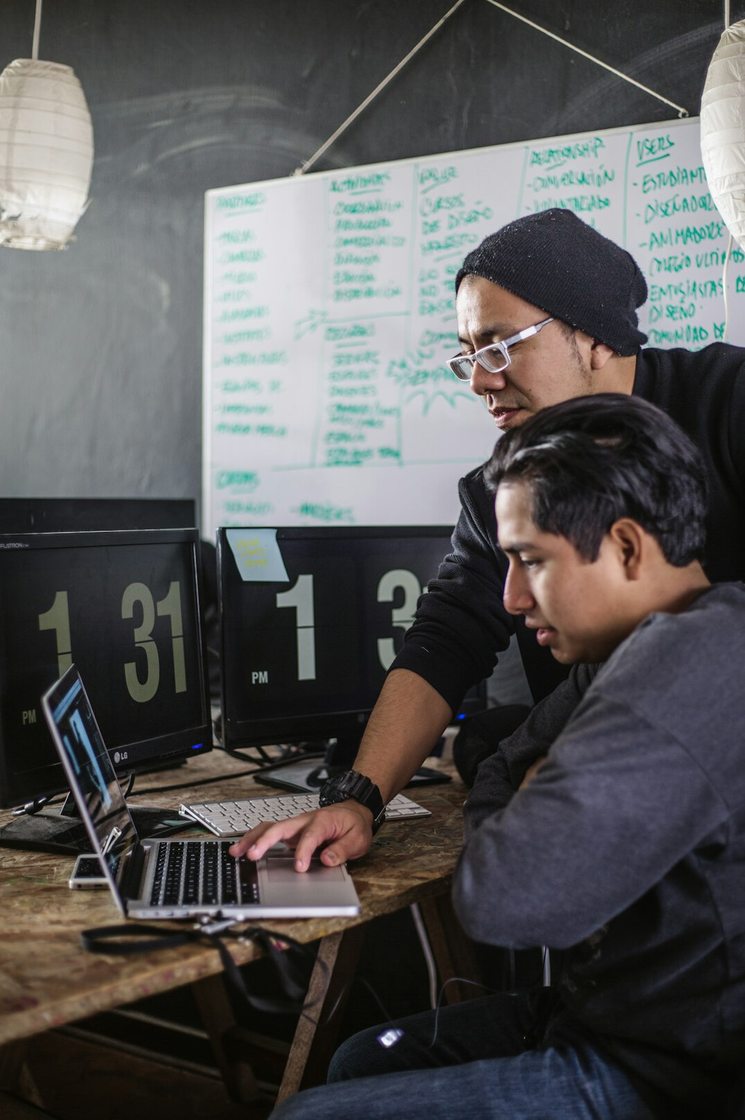 programmers working on laptops